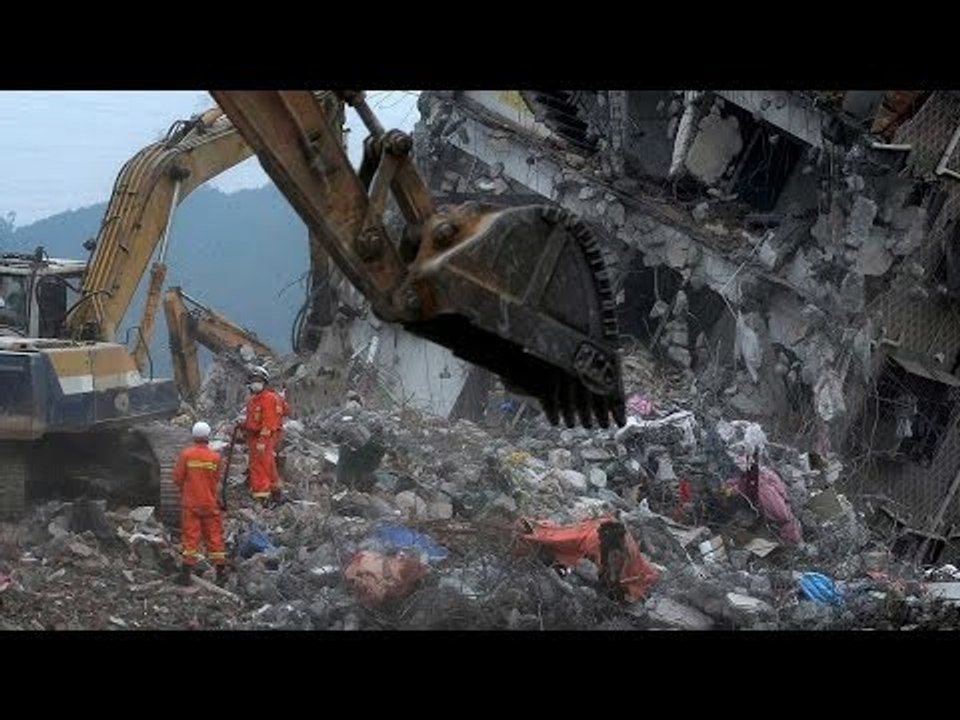 China Landslide: Man pulled alive from debris after 60 hours
