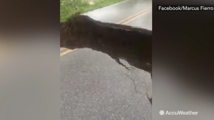 Man nearly drives over collapsing road in Arkansas