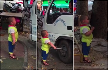 Download Video: Un enfant Chinois mécontent menace un conducteur avec un couteau