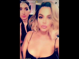 Kim Kardashian puckers up during KUWTK party