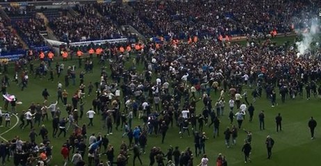 Fans Storm Pitch After Bolton Secures League Promotion at Macron Stadium