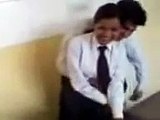 School Girl & Boy Kissing In Classroom Clip
