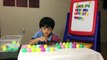 Learning ABC by matching surprise eggs with fridge letter magnets-KvL