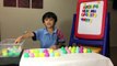 Learning ABC by matching surprise eggs with fridge letter magnets-KvLq