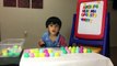 Learning ABC by matching surprise eggs with fridge letter magnets-Kv