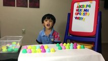 Learning ABC by matching surprise eggs with fridge letter magnets-KvLqA