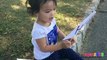 Toddler learning ABC Alphabets on a White Flags _ Fun outdoors park-nQa