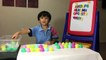 Learning ABC by matching surprise eggs with fridge letter magnets-KvLqAuu