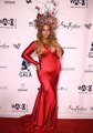 Beyonce flaunts her growing baby bump at art gala