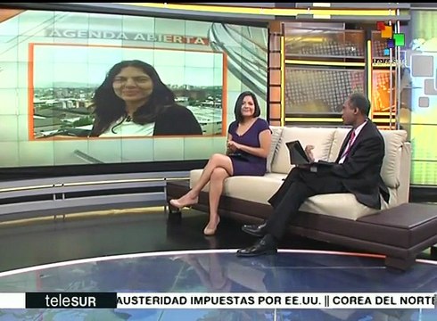 Venezolanos marchan para celebrar logros del gobierno en lo laboral