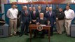 Trump signs order 'to keep jobs and wealth' in America