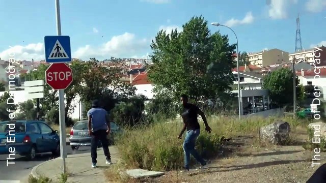 Lisbon, Portugal: Police shoots poor residents who fight back with stones.