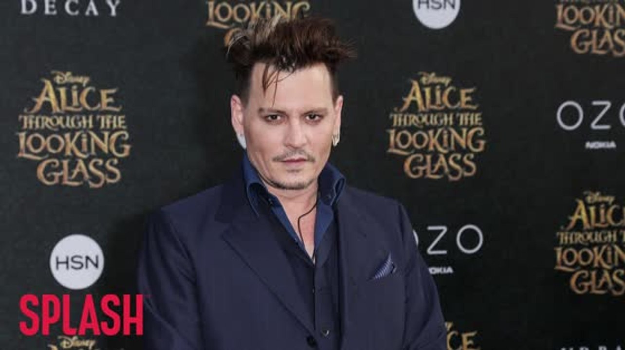 Johnny Depp Accused of Wearing Ear Piece to Avoid Learning Lines