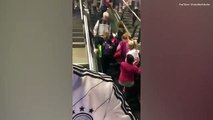 Hilarious moment elderly couple walk the wrong way down an escalator