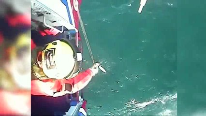 Raw- U.K. surfer rescued after 30 hours at sea