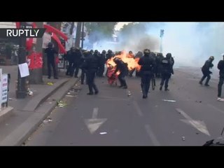 Clashes erupt between police & demonstrators during Paris protest