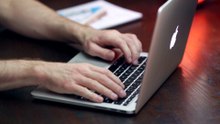 Person Working on an MacBook
