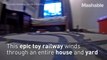 Ride this tiny train through the gigantic Lego railroad of your dreams