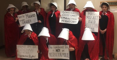 Eleven 'Handmaids' Protest Restrictions on Reproductive Care at Missouri State Capitol