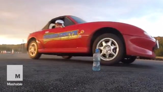 Teen stunt driver masters donuts, and bottle flips