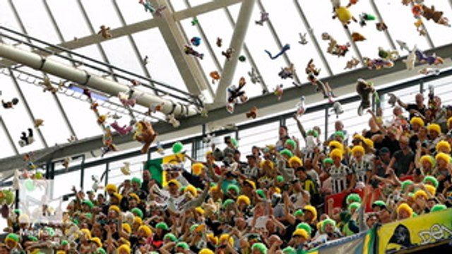 Soccer fans throw hundreds of stuffed animals to sick kids sitting below