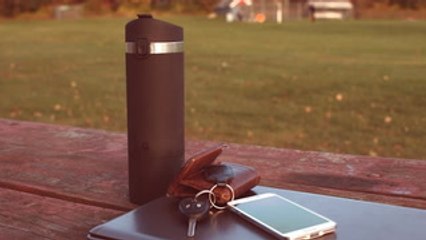 This mug brews a cup of coffee while on the go