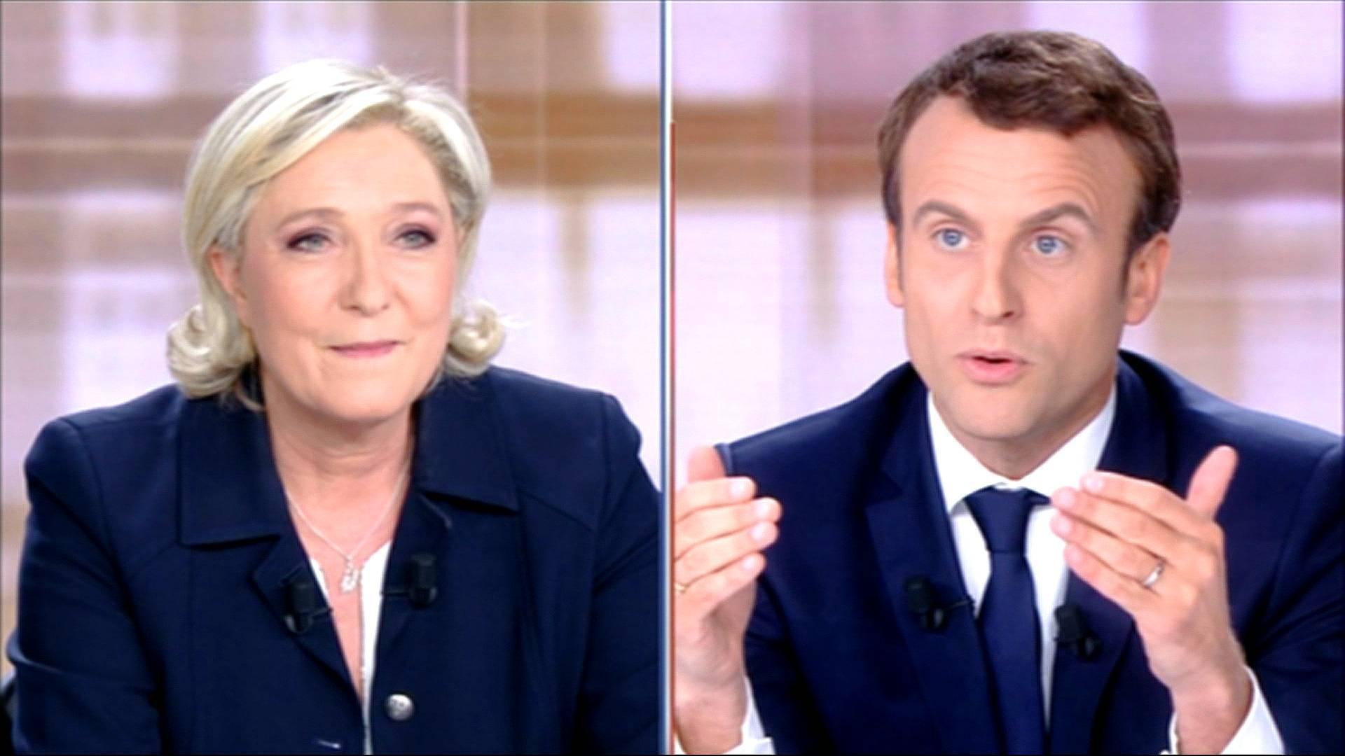 French election: Le Pen, Macron clash in heated debate - video Dailymotion