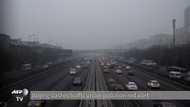 Beijing slashes traffic under pollution red