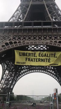 Greenpeace Unfurls 'Resist' Banner From Eiffel Tower Ahead of Election