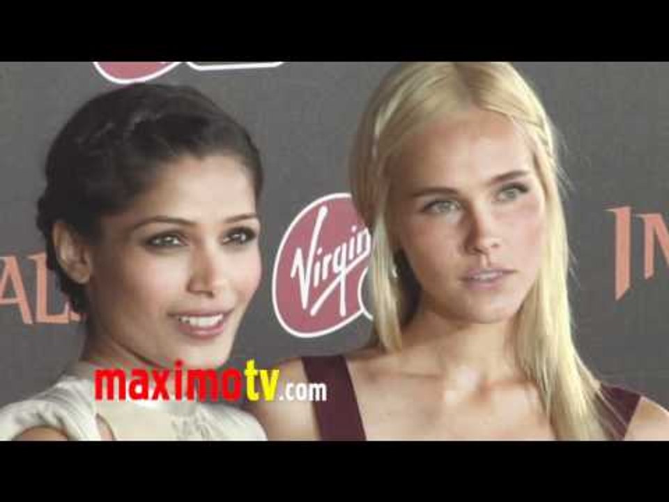 Freida Pinto and Isabel Lucas at IMMORTALS World Premiere Arrivals