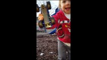 Aden and Ethan video mashup of playing on slides at the playground