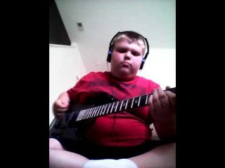 Extremely Talented Kid Slays It on Electric Guitar