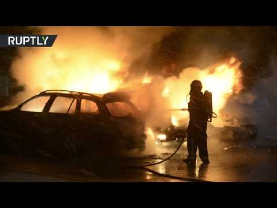 Firefighters battle to extinguish car fires in Stockholm suburb