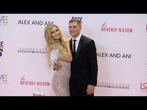 Paris Hilton and Chris Zylka 2017 Race to Erase MS Gala Orange Carpet