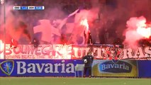 Ballboy and firework explodes right behind him