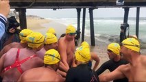 A group of athletes swam across the US-Mexico border