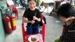 BÉ GÁI ĂN ĐUÔNG DỪA SỐNG - Challenge cute kid eating live coconut larvae