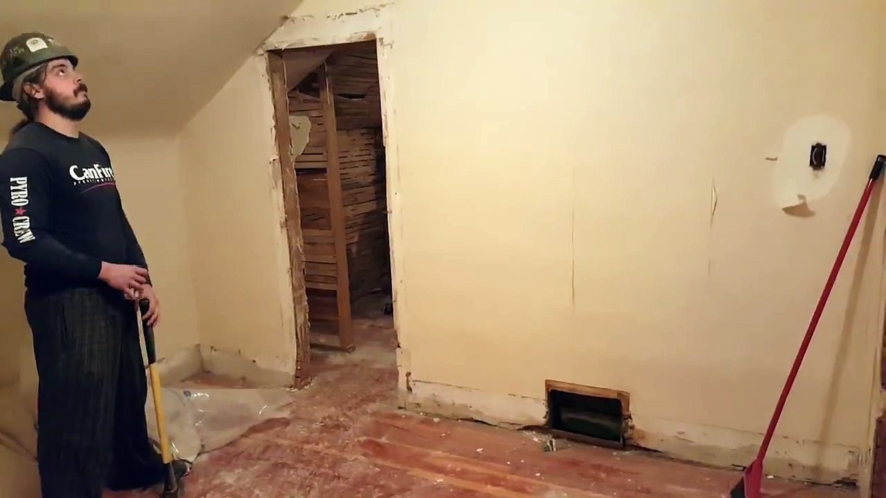 Construction Worker Breaks through Wall