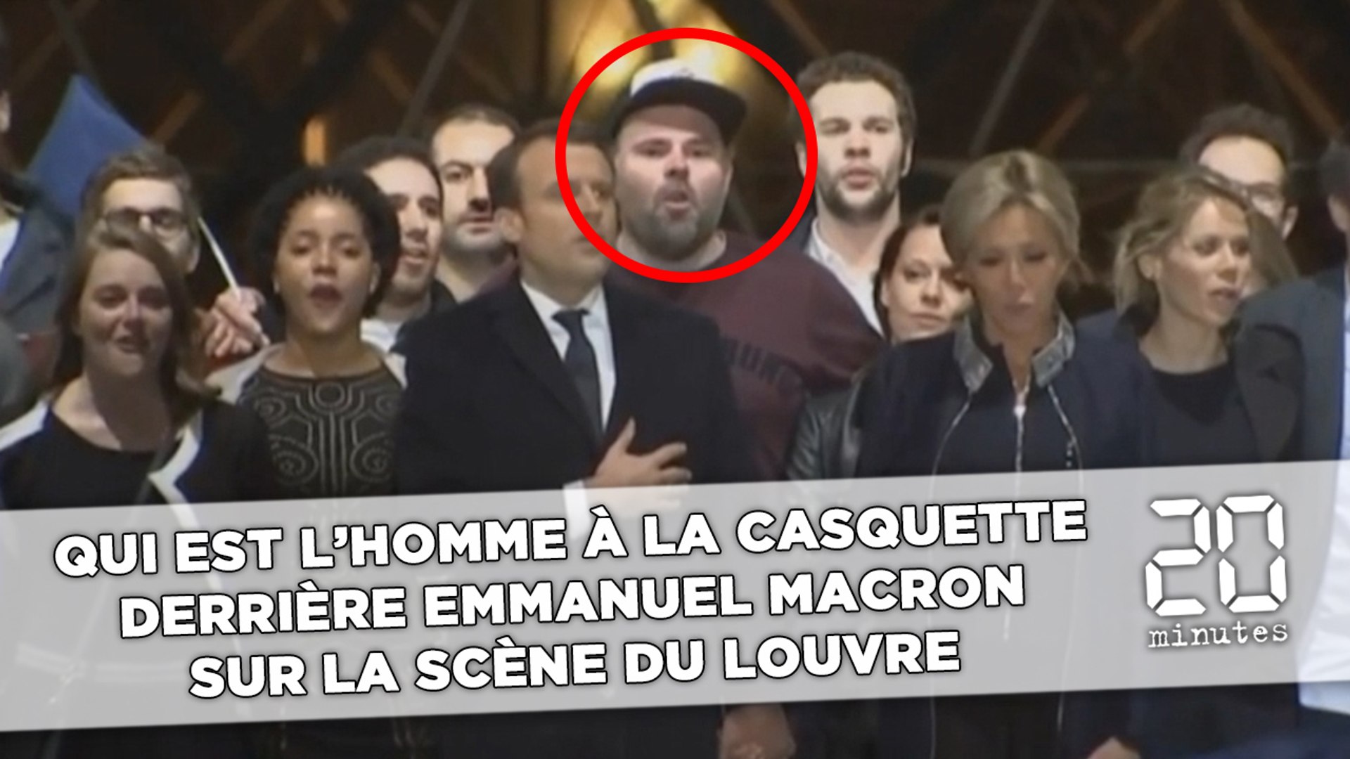 Qui est l'homme à la casquette derrière Emmanuel Macron sur la scène du  Louvre ? - Vidéo Dailymotion