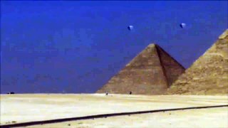 Pyramid Shape UFO Hovering In The Sky