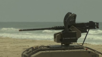 Marines Test A Machine Gun-Wielding Robot