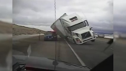 Empty Police Car Crushed By Toppling Lorry