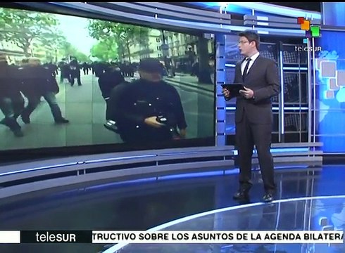 Cientos de parisinos se enfrentan a la policía; rechazan a nuevo pdte.