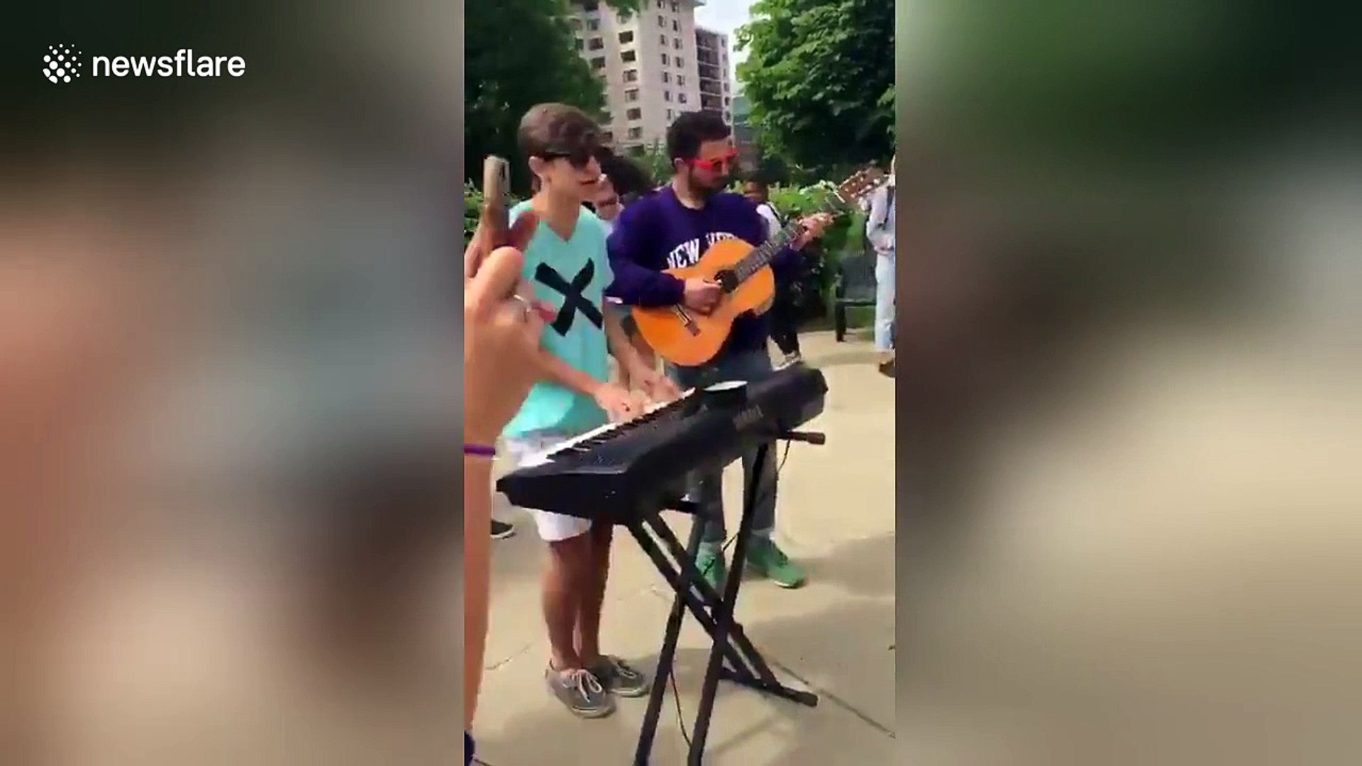Romantic youngster performs Ed Sheeran song for prom proposal