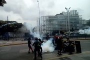 Caracas Protesters Use Makeshift Shields to Protect Against Tear Gas 'Bombs'