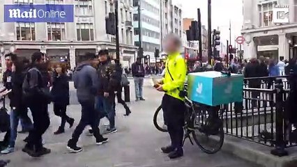 Deliveroo driver stops delivery to preach from a bible in London