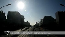 Beijing lifts smog red alert as blue skies
