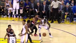 Draymond Green kicks at Allen Crabbe234wer