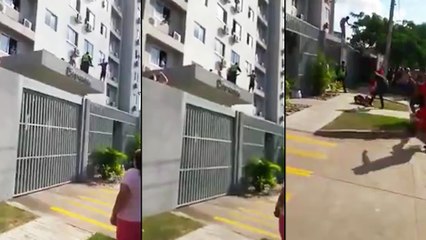 Un mec drogué pense plonger dans une piscine