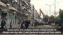Syria army, civilians reclaim ruined Alqweqwe21